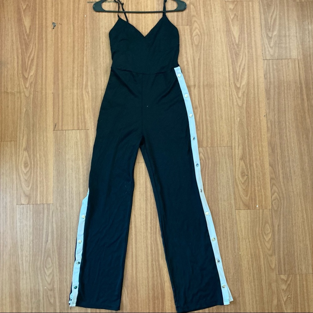 Black sleeveless jumpsuit